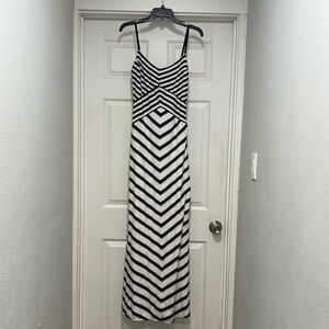 Bebe black & white maxi dress, size medium., adjustable straps and side zipper.